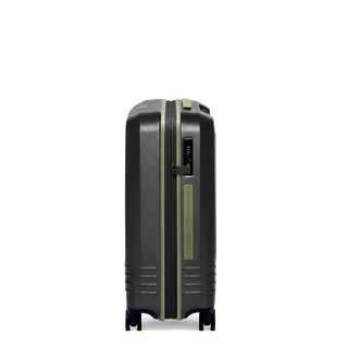ROAM Matte Edit hardside expandable check-in suitcase in matte black with green trim, side view