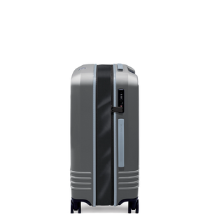 ROAM Matte Edit hardside expandable check-in suitcase in matte steel with slate trim, side view, expanded