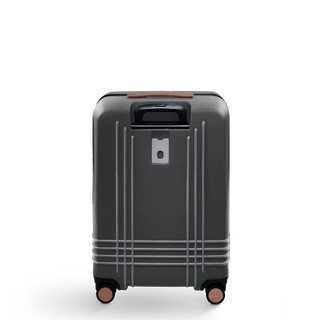 ROAM Matte Edit hardside check-in suitcase in matte steel with saddle trim, back view