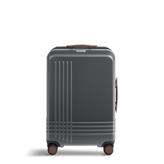 ROAM Matte Edit hardside check-in suitcase in matte steel with saddle trim, front view