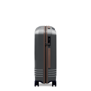 ROAM Matte Edit hardside check-in suitcase in matte steel with saddle trim, side view