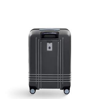 ROAM Matte Edit hardside check-in suitcase in matte steel with slate trim, back view