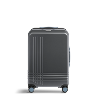 ROAM Matte Edit hardside check-in suitcase in matte steel with slate trim, front view