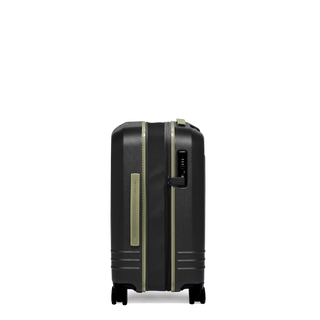 ROAM Matte Edit hardside expandable carry-on suitcase in matte black with green trim, side view, expanded
