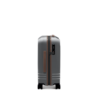 ROAM Matte Edit hardside expandable carry-on suitcase in matte steel with saddle trim, side view