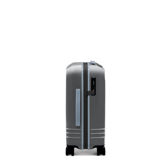 ROAM Matte Edit hardside expandable carry-on suitcase in matte steel with slate trim, side view