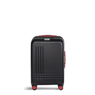 ROAM Matte Edit hardside carry-on suitcase in matte black with red trim, front view