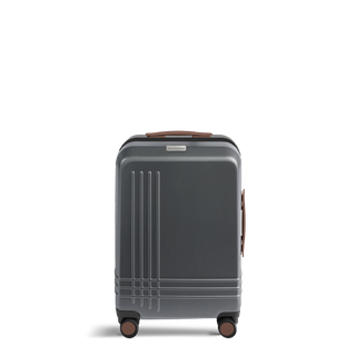 ROAM Matte Edit hardside carry-on suitcase in matte steel with saddle trim, front view