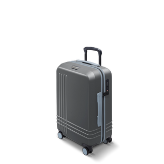 ROAM Matte Edit hardside carry-on suitcase in matte steel with slate trim, three-quarter view