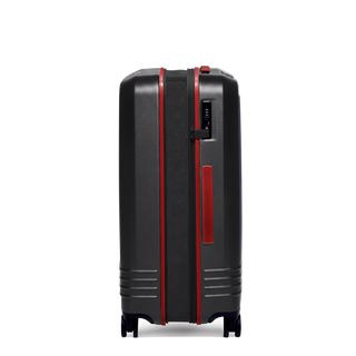 ROAM Matte Edit hardside expandable large check-in suitcase in matte black with red trim, side view, expanded