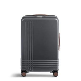 ROAM Matte Edit hardside large check-in suitcase in matte steel with saddle trim, front view