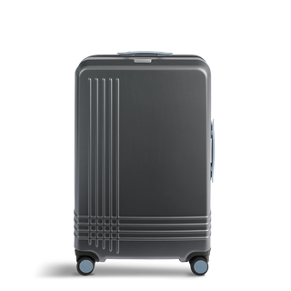 ROAM Matte Edit hardside large check-in suitcase in matte steel with slate trim, front view