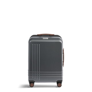 ROAM Matte Edit hardside large carry-on suitcase in matte steel with saddle trim, front view