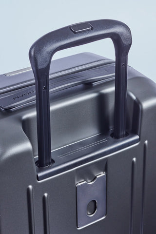 ROAM Matte Edit hardside suitcase in matte steel, telescoping trolley handle detail